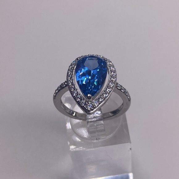 BLUE TOPAZ SIMULATED STONES AROUND CENTER -SET IN STERLING SILVER (7) - Picture 6 of 7